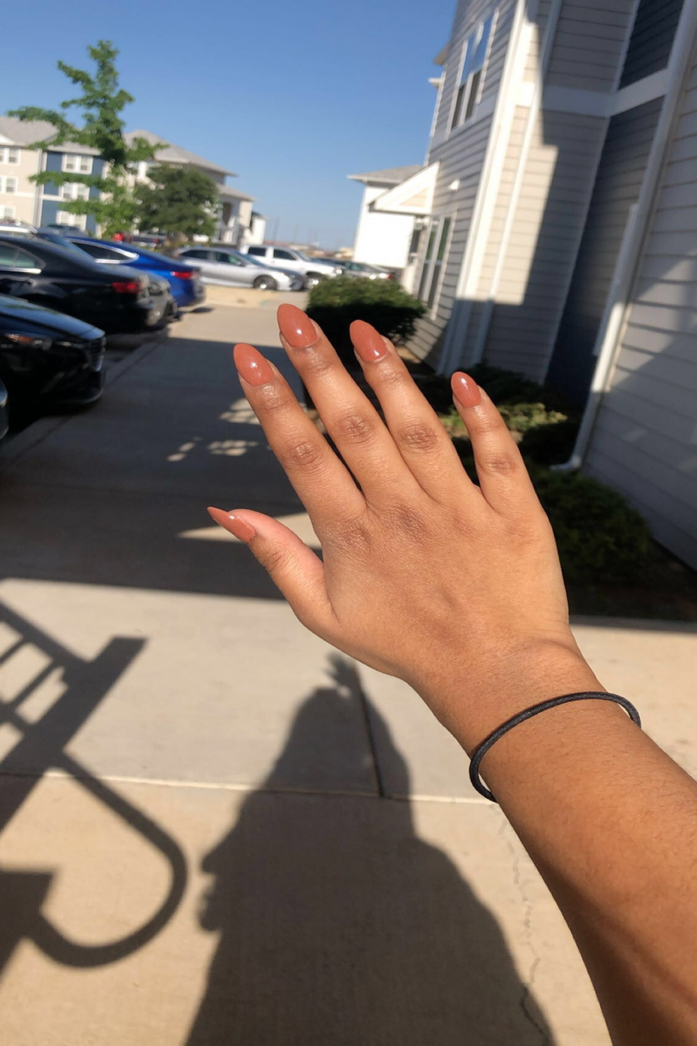 Light Brown Almond Nails  Dark skin nail color, Brown acrylic