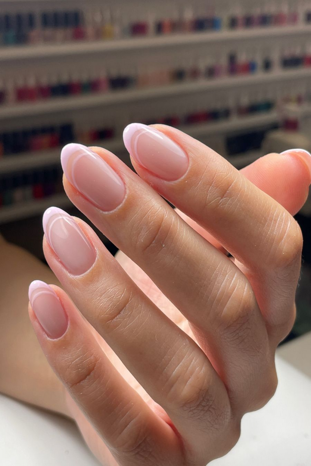 Neutral pink French manicure almond nails in   Pink tip nails