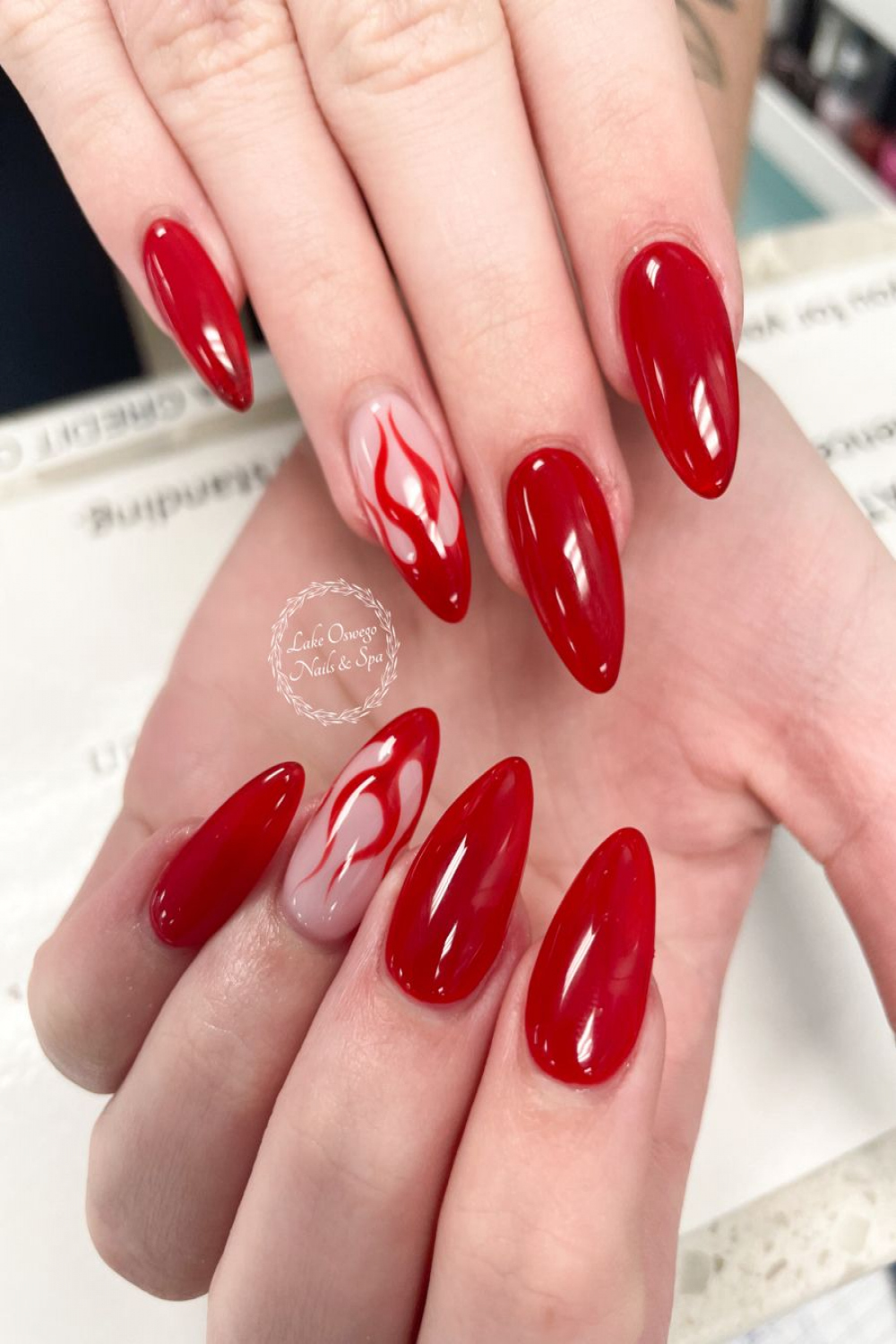 Red almond nails with flame art  Red nails, Nail art, Red acrylic