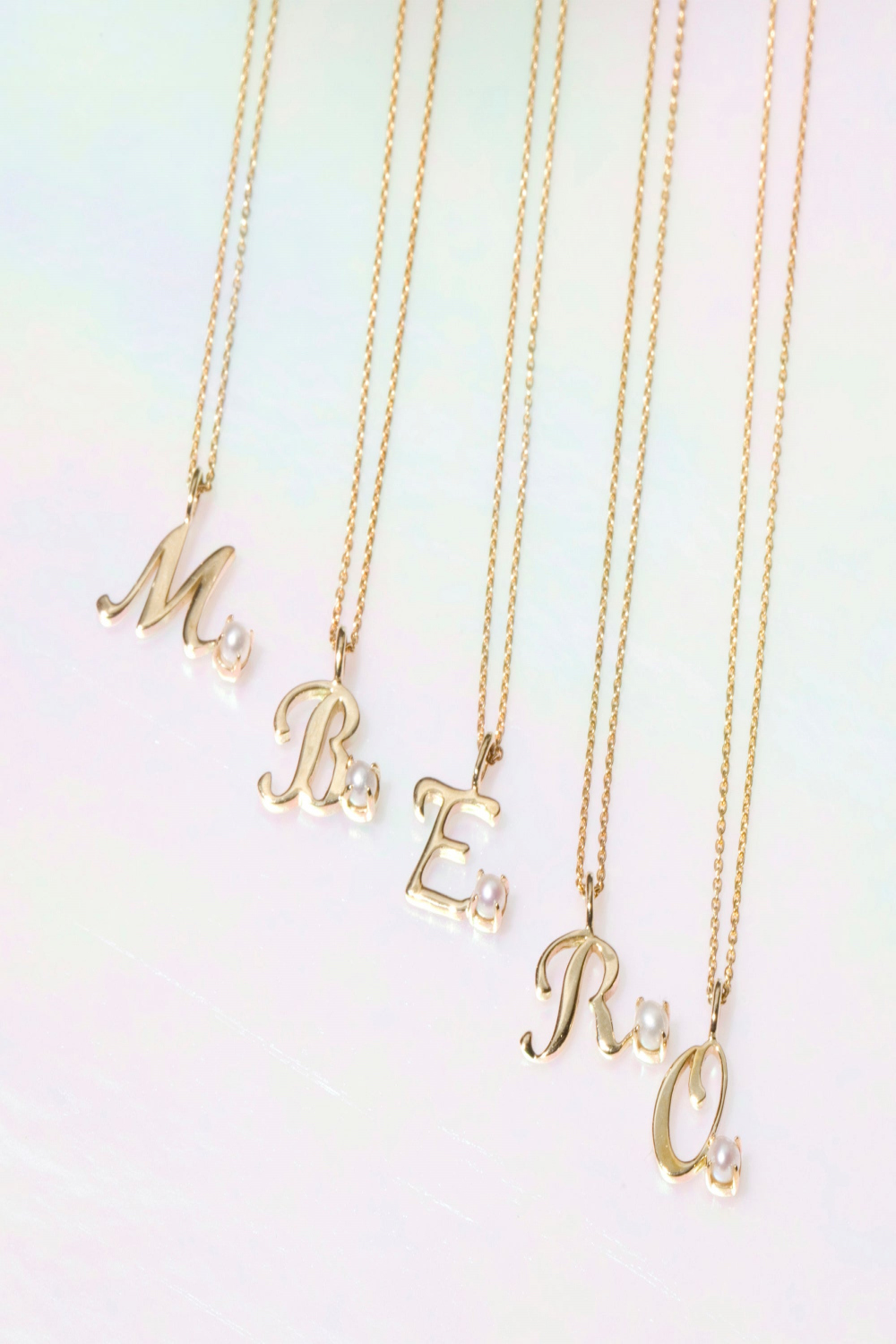 Teeny Pearl Cursive Initial Necklace – STONE AND STRAND