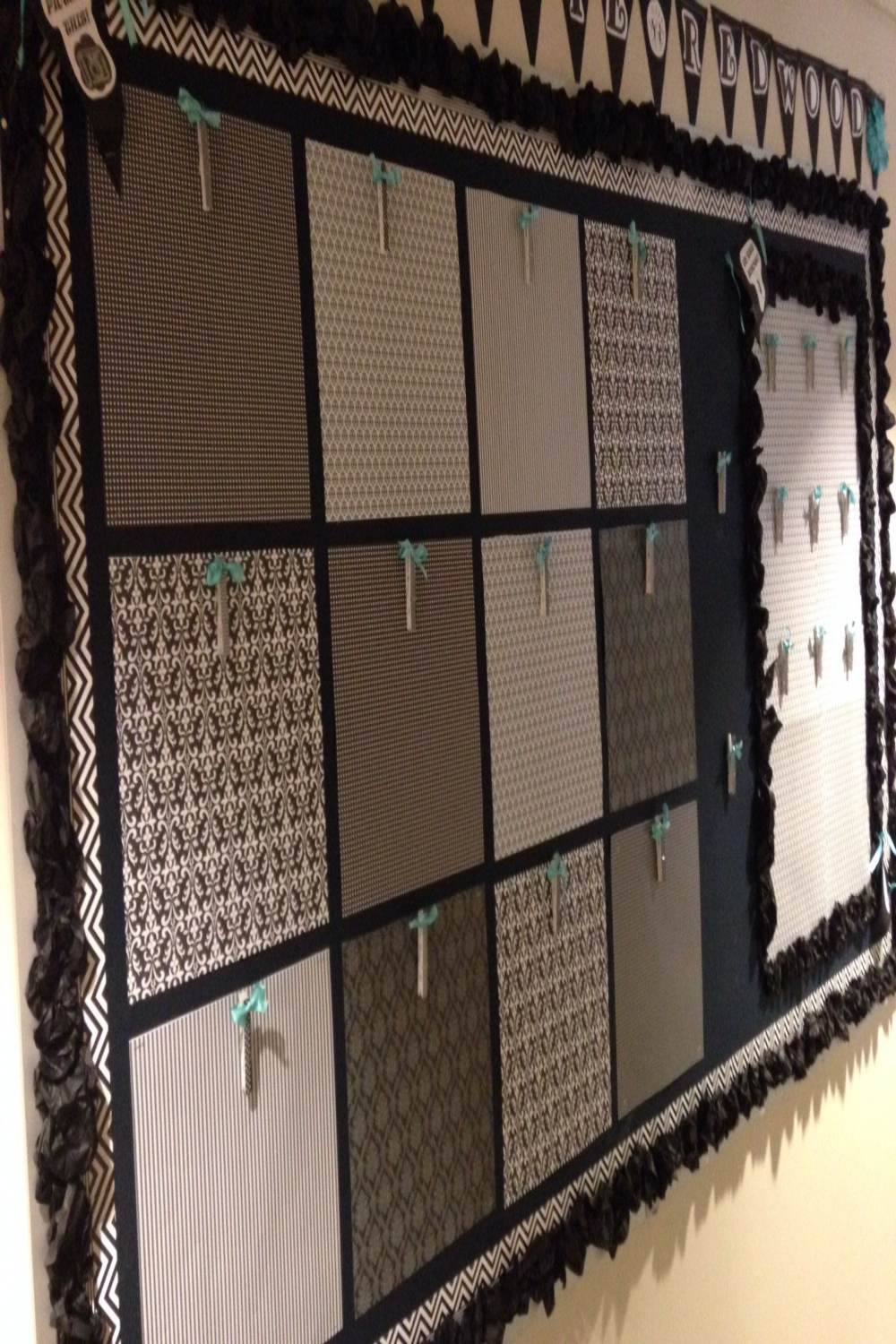 Another view of black , white and teal bulletin board to display